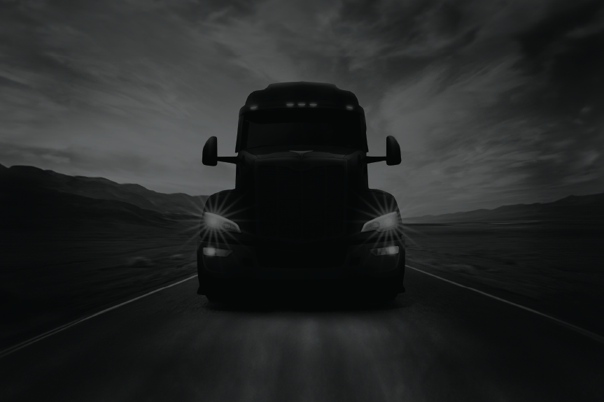 screened Peterbilt truck at night